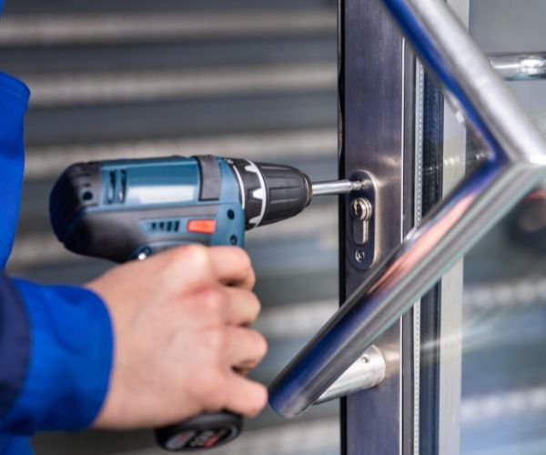 New door lock being installed